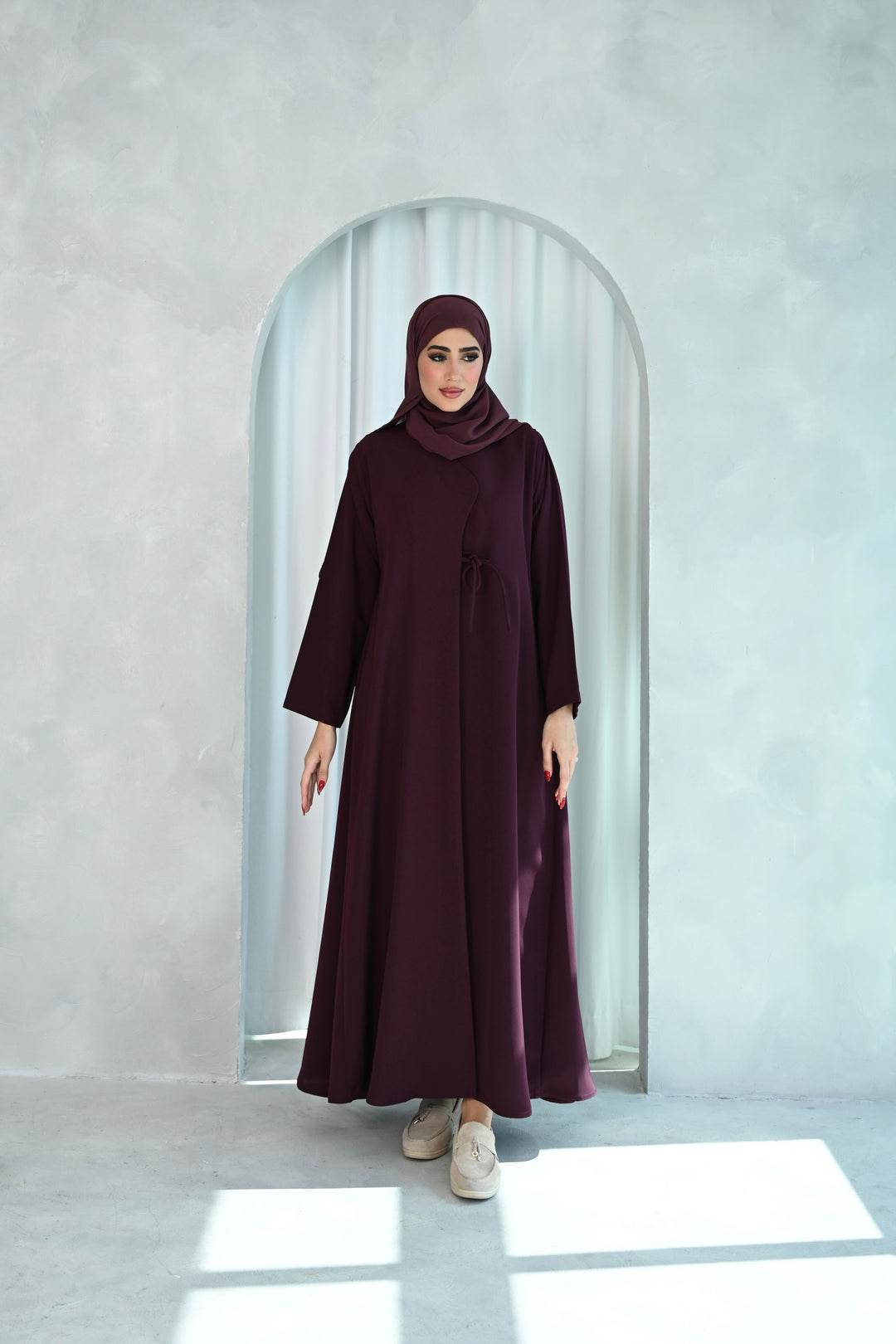 Deep Plum Embroidered Abaya with Graceful Floral Design