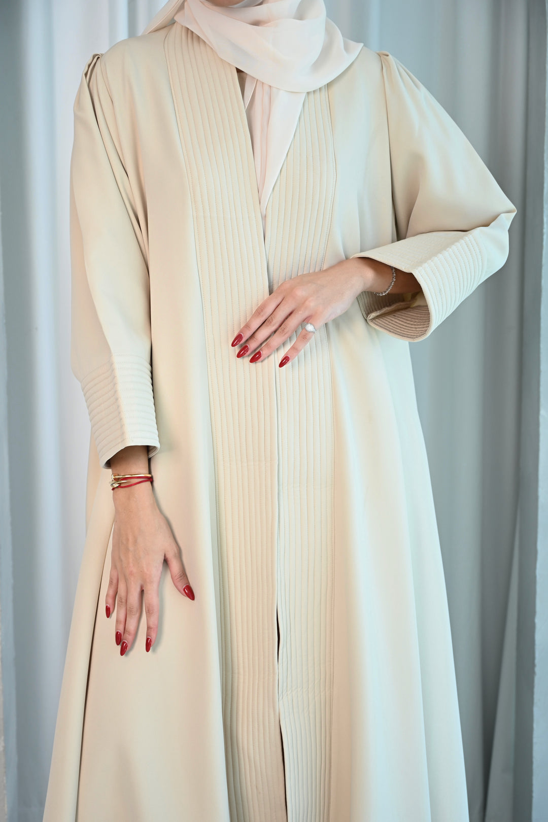 Elegant Beige Pleated Abaya with Minimalist Charm