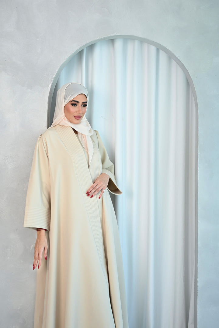 Elegant Beige Pleated Abaya with Minimalist Charm