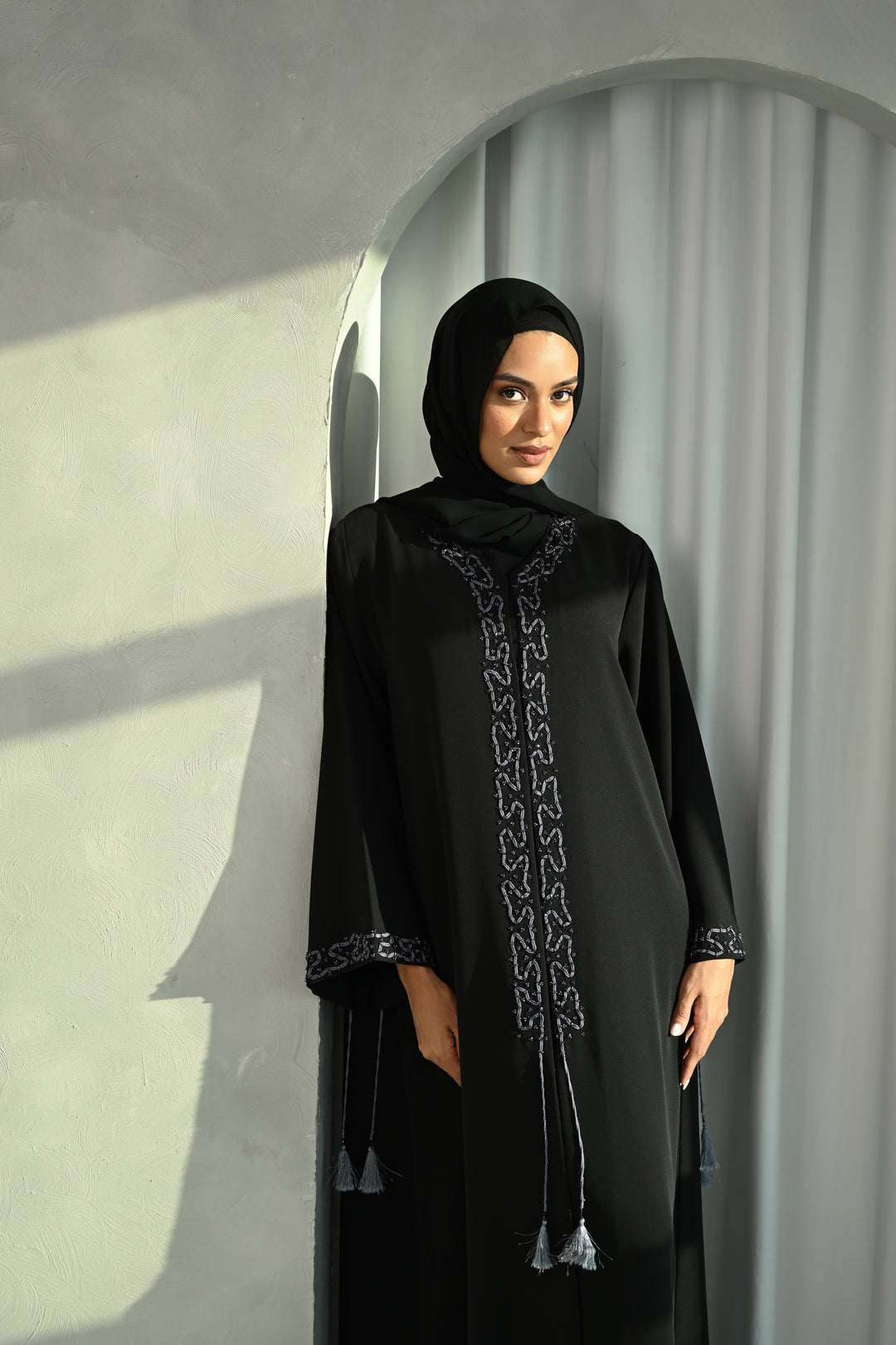 Black Tassel-Trimmed Abaya with Elegant Embroidery