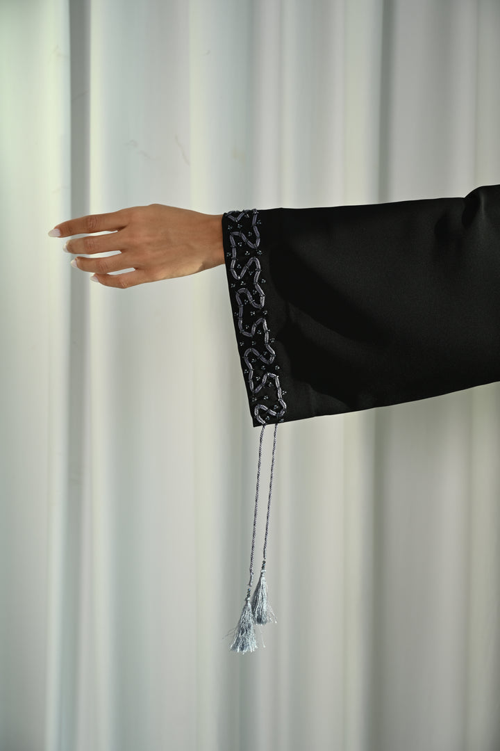 Black Tassel-Trimmed Abaya with Elegant Embroidery