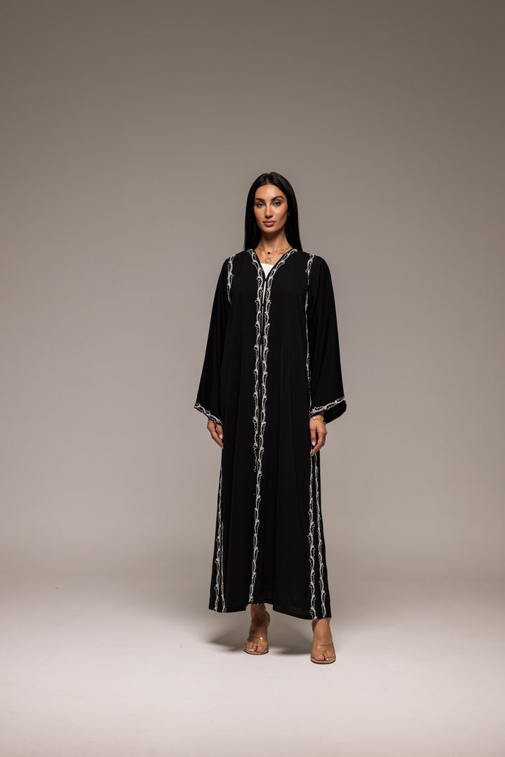 Midnight Muse: Sophisticated Black Abaya with Intricate White Embroidery