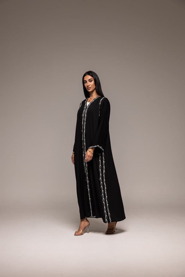 Midnight Muse: Sophisticated Black Abaya with Intricate White Embroidery