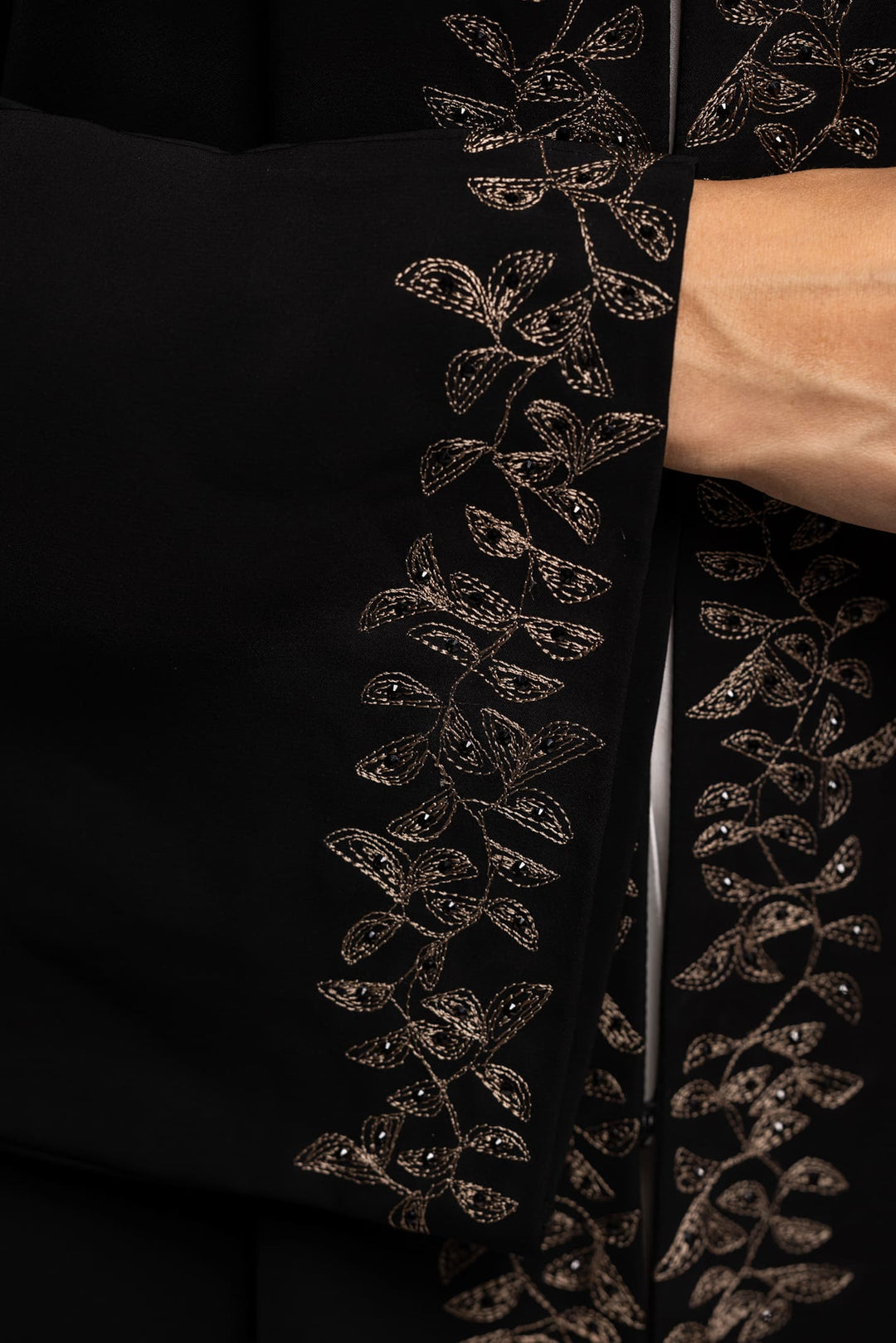 Sable Sophistication: Majestic Black Abaya with Golden Ornate Accents